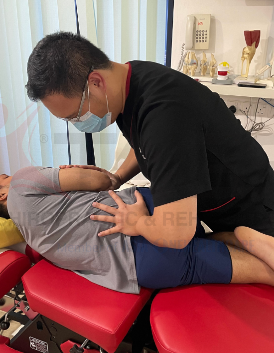 Chiropractic adjustment for lower back pain